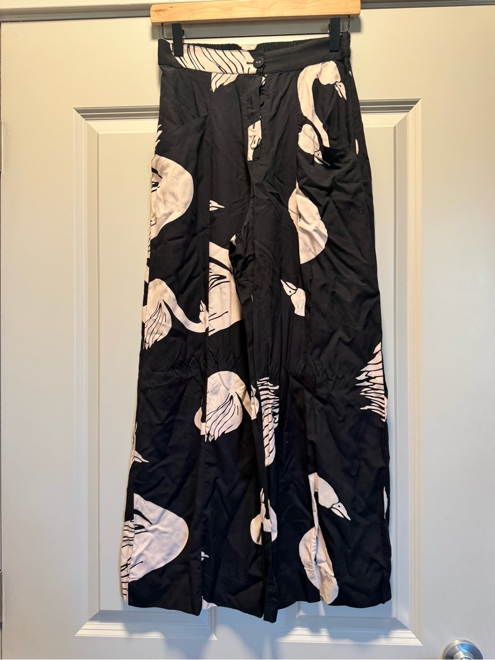 The Odells Vintage Black Wide-Leg Trousers with White Swan Print